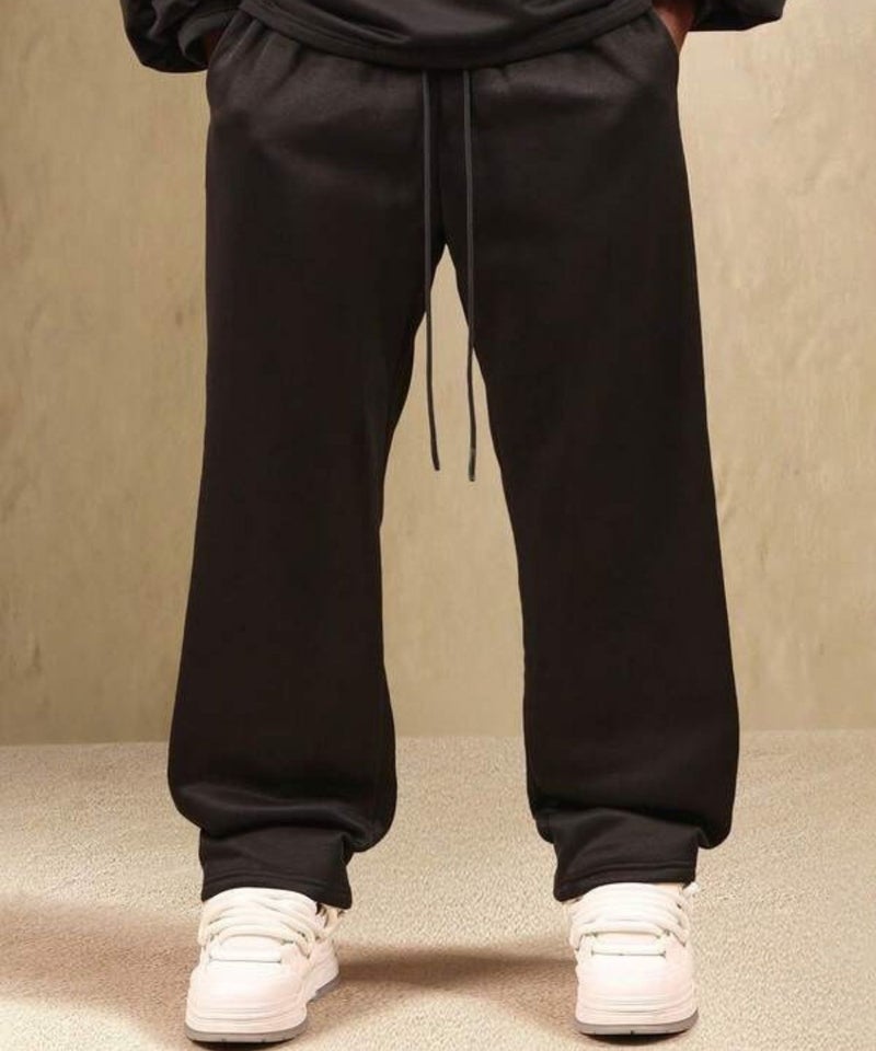 FLYNOFF Heavyweight Solid Black Relaxed Fit Sweatpants with Drawstring Closure and Tapered Legs - Image 1